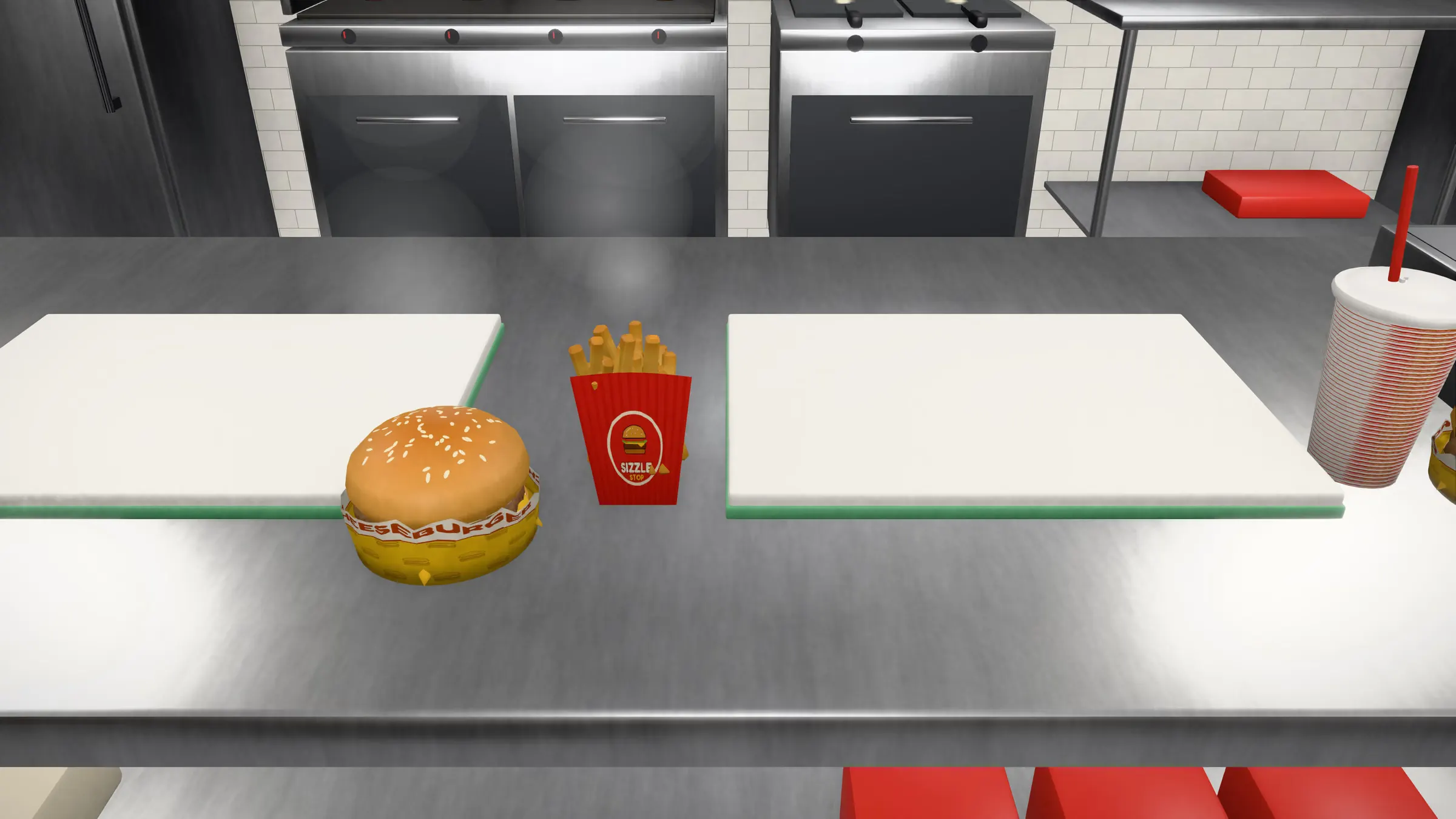 A cheeseburger, a box of fries and a lidded cola on the prep counter.